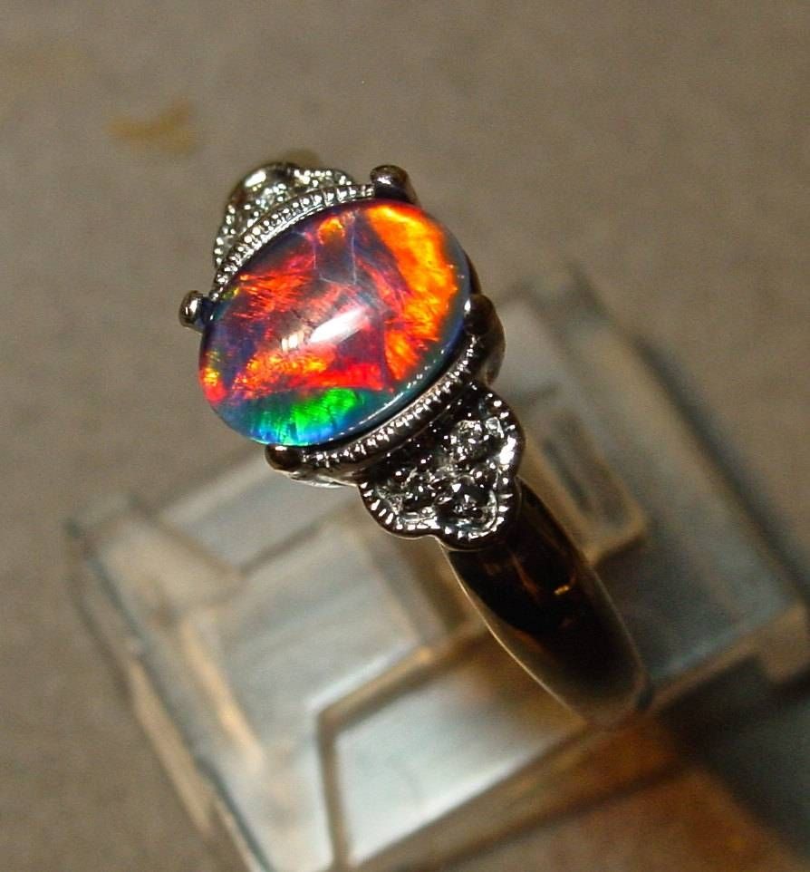 Antique Style Opal Engagement Ring With Diamond Accents. Intended For Australia Opal Engagement Rings (Photo 4 of 15)