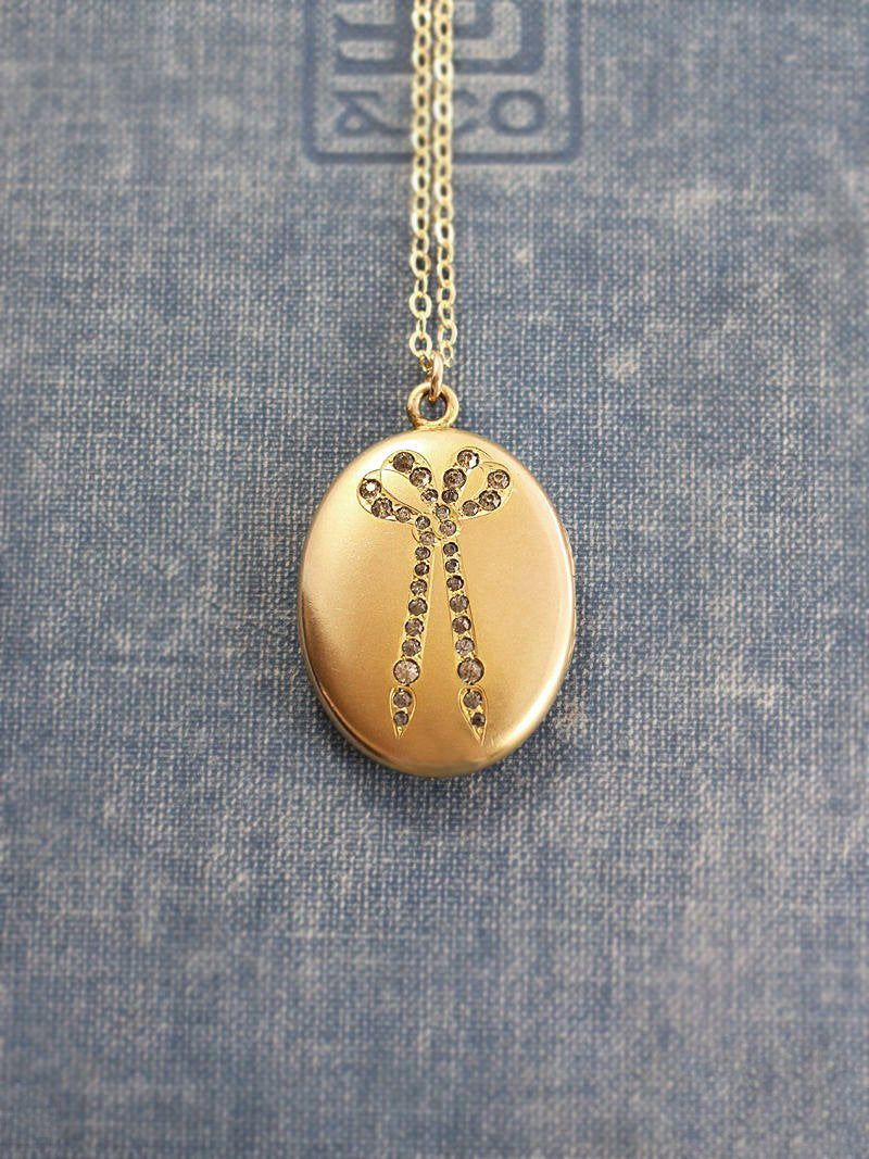 Antique Gold Locket Necklace, Sparkling Paste Stone Bow Oval Intended For Newest Sparkling Bow Necklaces (View 10 of 25)
