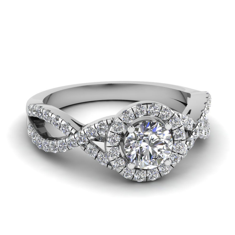 Halo Engagement Rings | Fascinating Diamonds Regarding Most Recent Baguette And Round Diamond Weaved Anniversary Rings In White Gold (View 17 of 25)