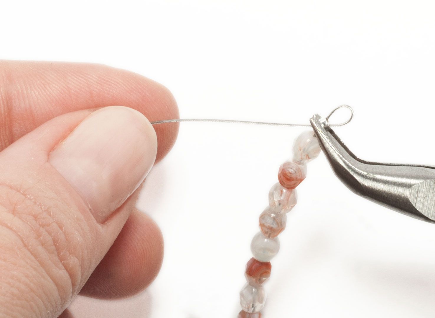 How To String Beads With Beading Wire Regarding Most Recently Released Strings Of Beads Rings (View 18 of 25)
