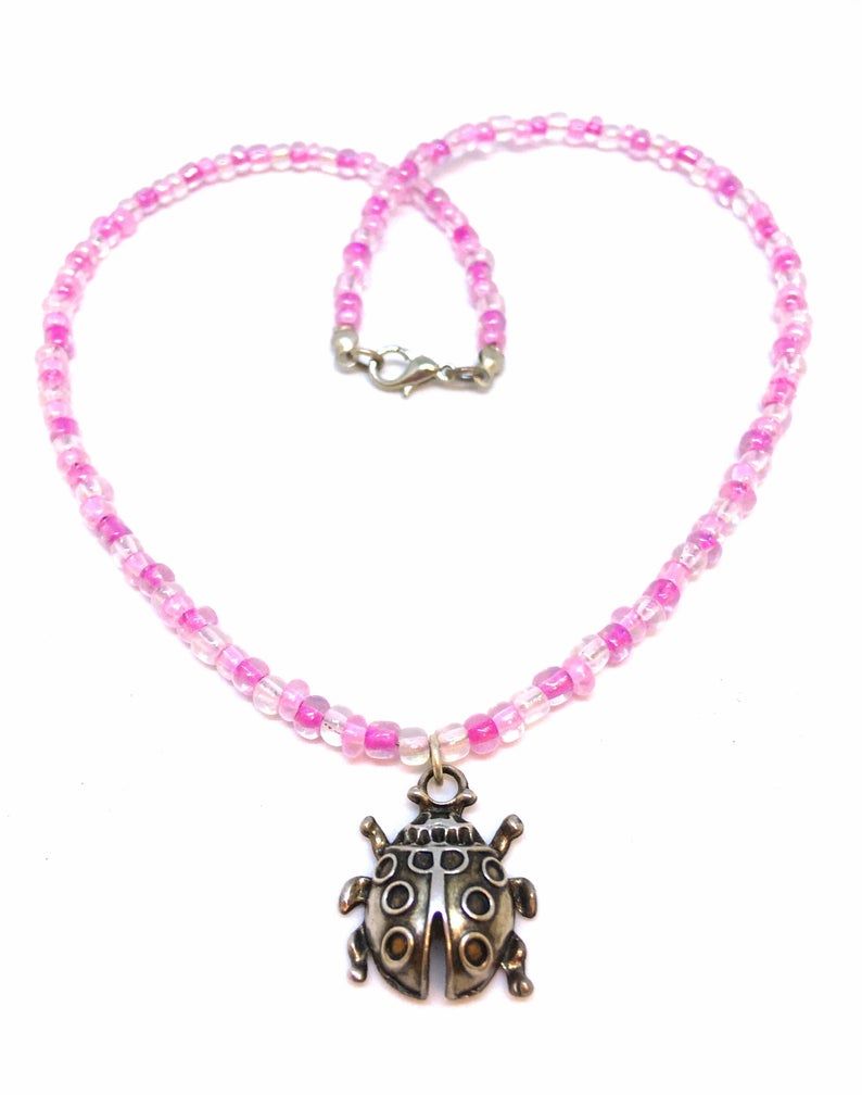 Ladybird Pendant Necklace With Pink Seed Beads App 16 Inches Juliedeeleyjewellery Contemporary Jewellery Gifts For Her Ladies Necklace With Regard To Latest Pink Ladybird Pendant Necklaces (View 1 of 25)