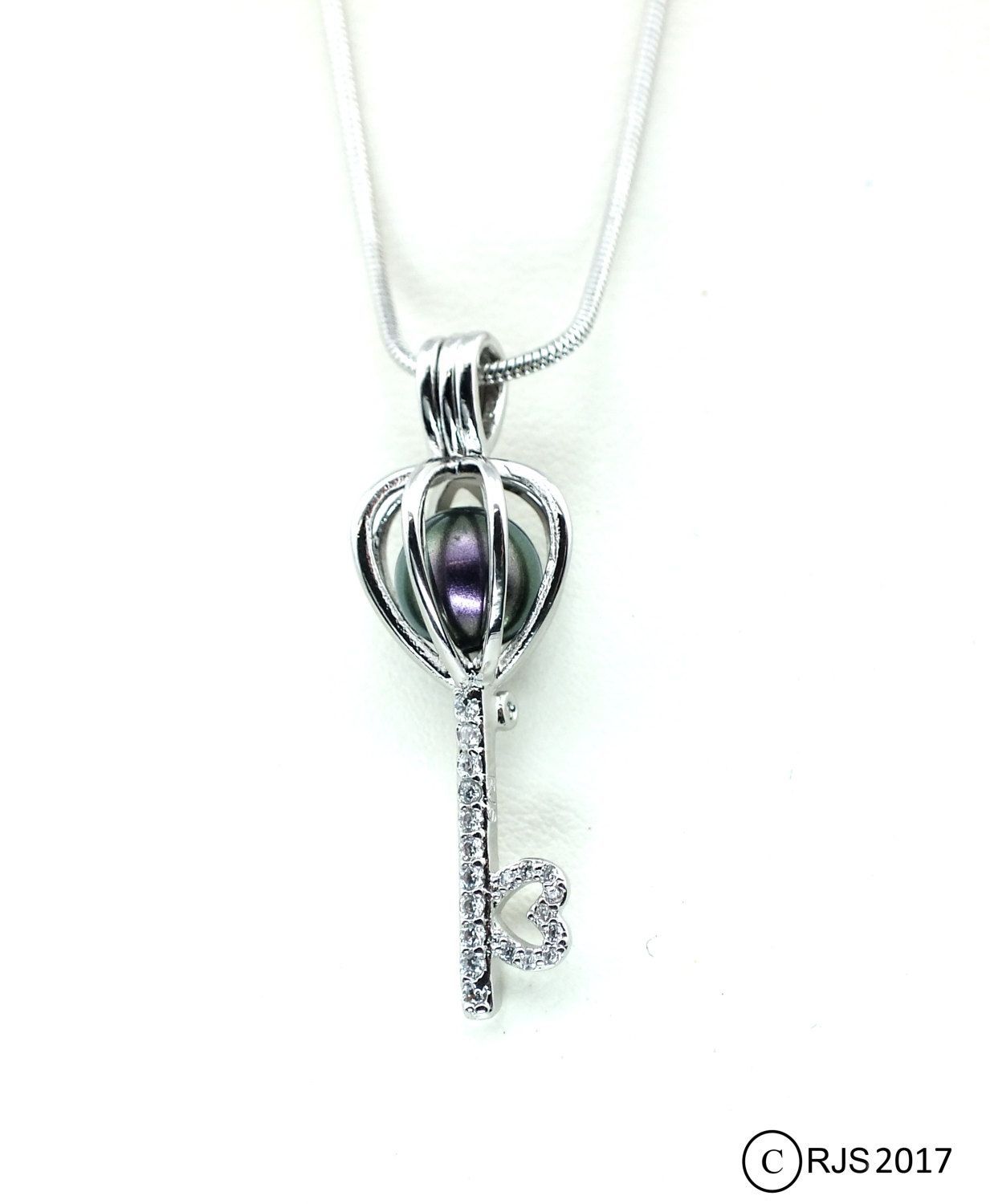 Pick A Pearl Cage Silver Plated Crystal Heart Key Pendant Locket For Latest Beaded Heart Key Locket Element Necklaces (View 2 of 25)