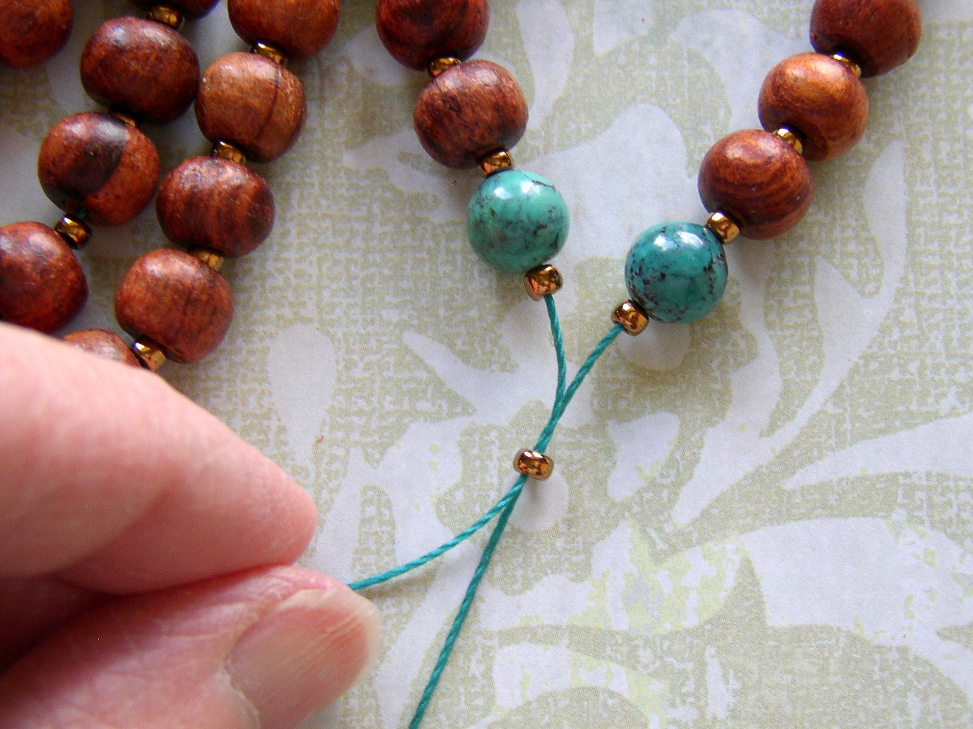 Turn The String Of Beads Into A Mala Necklacebringing The Ends Pertaining To Newest Strings Of Beads Rings (View 6 of 25)