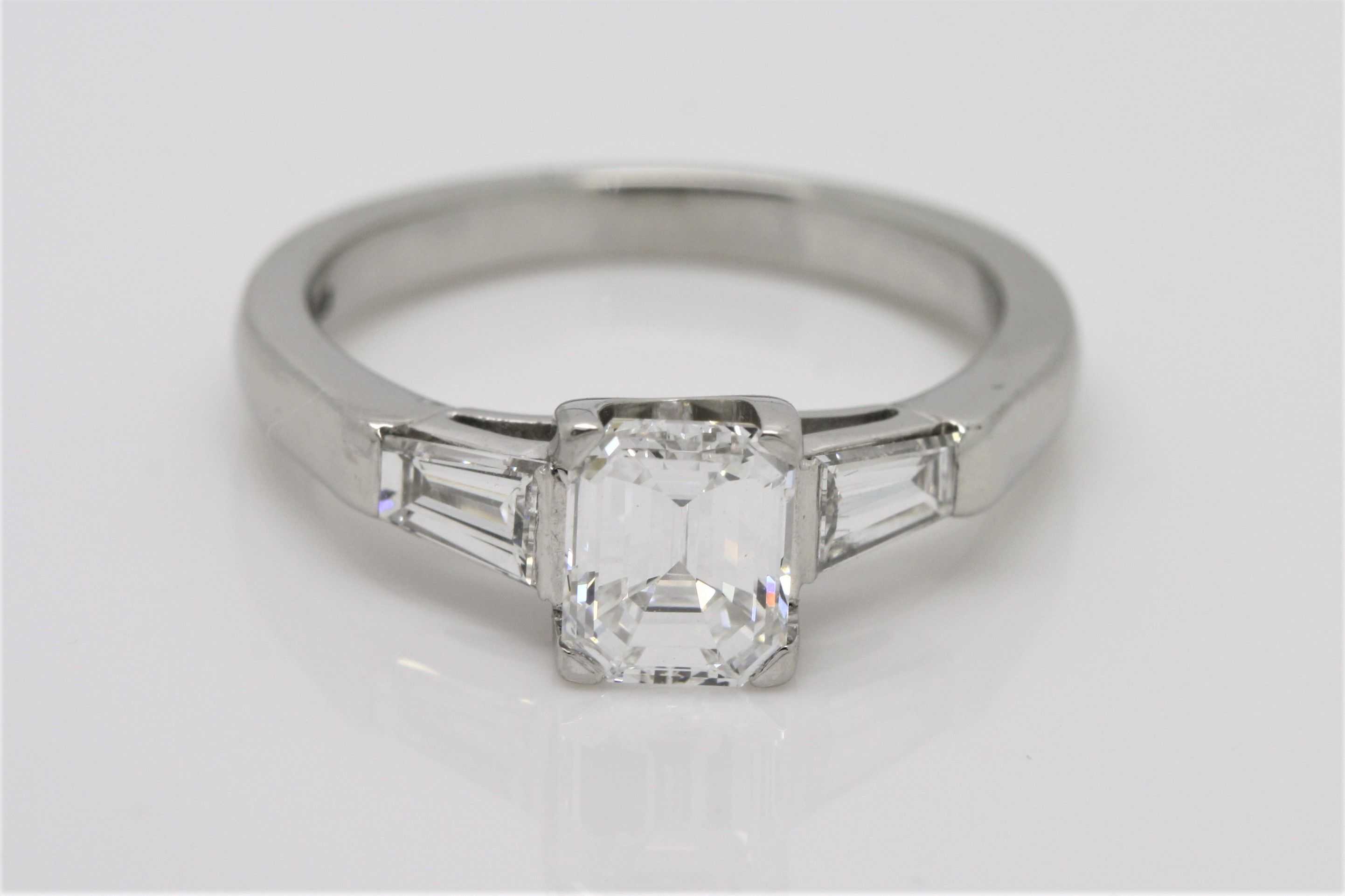 Emerald Cut Diamond Solitaire With Diamond Tapered Baguette Side Stones In  Platinum Ring Inside Cushion Cut Engagement Rings With Tapered Baguette Side Stones (View 10 of 25)