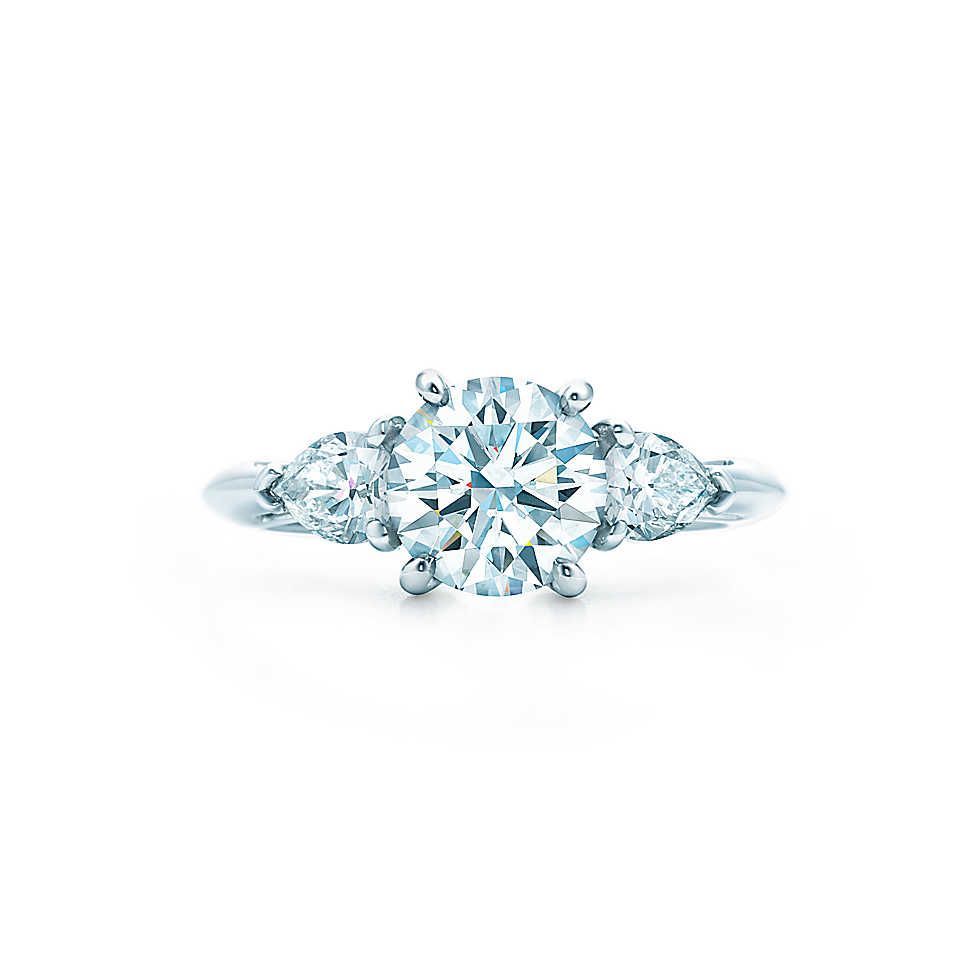 Round Brilliant Diamond Engagement Ring With Pear Shaped Within Round Brilliant Engagement Rings With Pear Shaped Side Stones (View 15 of 25)