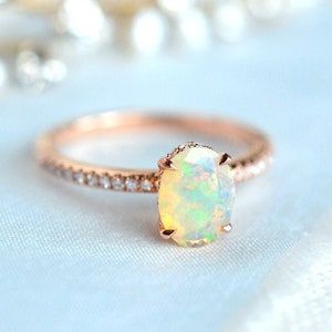 Elaine Opal Engagement Ring Oval Solitaire Hidden Diamond – Etsy With Oval Opal Rings With Diamond Side Accents (View 21 of 25)