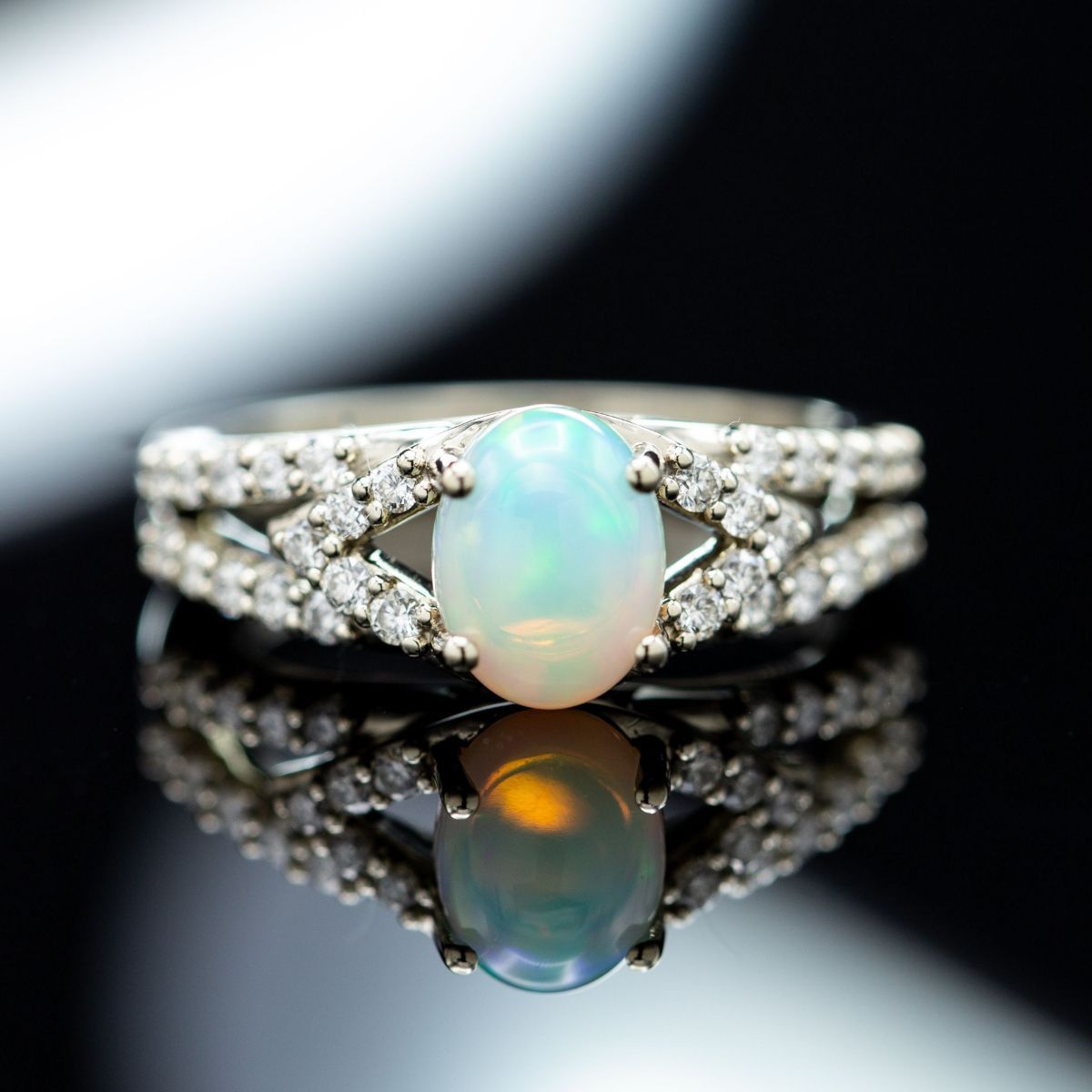 Opal Engagement Rings | Custommade Inside Oval Opal Rings With Diamond Side Accents (View 19 of 25)