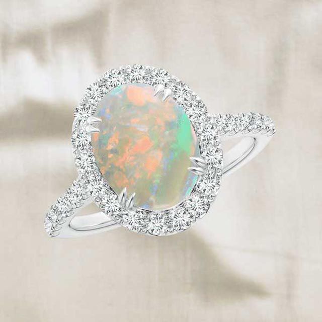 Opal Engagement Rings: The Complete Guide Inside Oval Opal Rings With Diamond Side Accents (View 9 of 25)