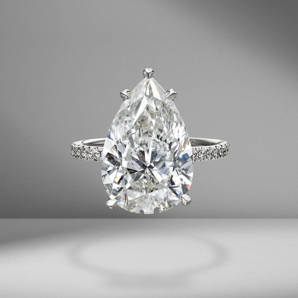 Pear Shaped Engagement Rings: The Complete Guide Within V Shaped Rings With Diamond Pave (View 11 of 25)