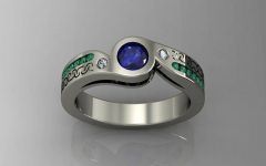 Emerald and Sapphire Engagement Rings