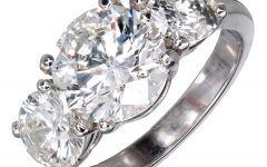 Three Stone Engagement Rings with Side Stones